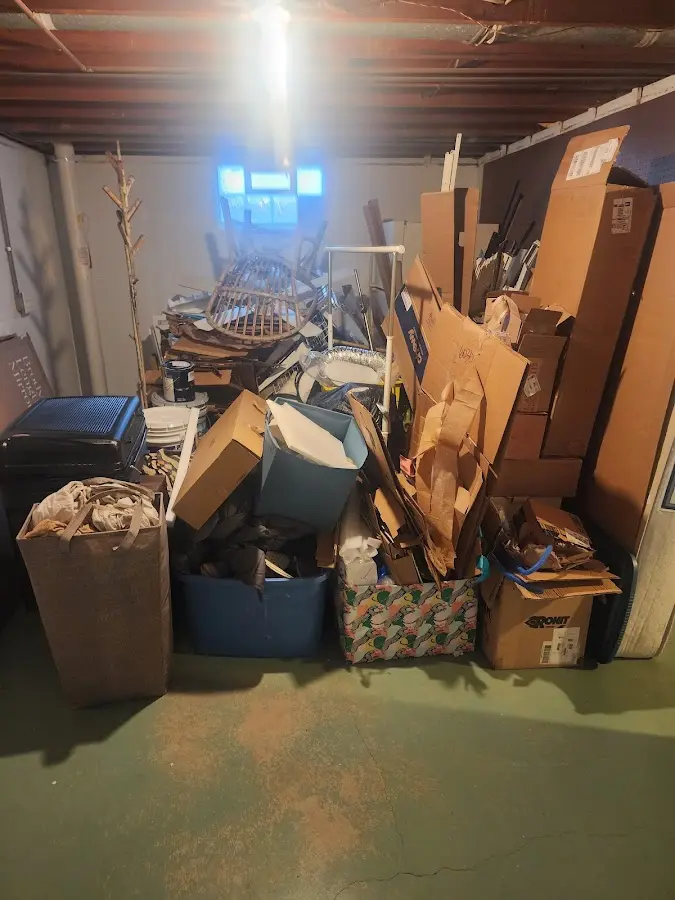 Roll-off dumpster container at job site for Yard Waste Dumpster Rental in Johnstown